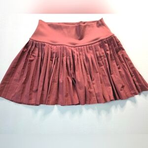 EUC ALO Yoga Grand Slam Tennis Skirt Mars Clay